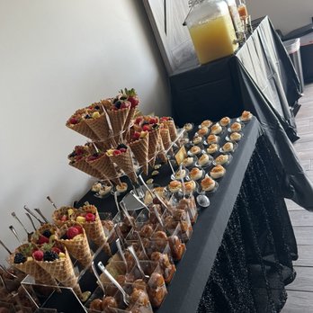 Queen C’s Catering - Appetizer table: Sweet Chili Meatballs, Fruit Cones and Deviled Eggs - Caterers Near Me - Jacksonville, Florida Queen C’s Catering - Appetizer table: Sweet Chili Meatballs, Fruit Cones and Deviled Eggs - Caterers Near Me - Jacksonville, Florida
