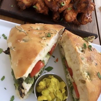 Patxi’s Pizza - Pesto sandwich and my hairy wings   Chicken Pesto Melt Sandwich Wings Your Way - Pizza Near Me - Porter Ranch, California