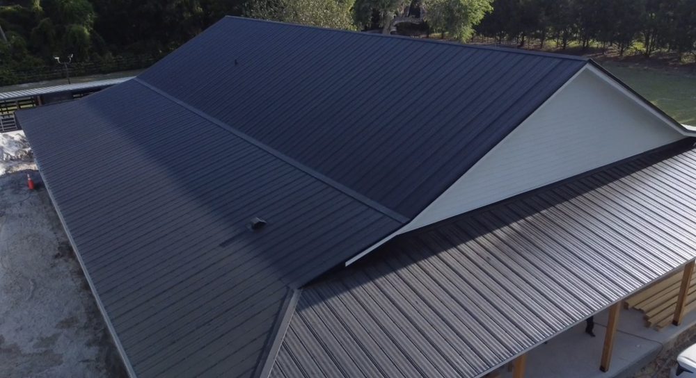 Slide of Tip Top Roofing