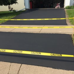 Sun Seal Driveway Repair and Maintenance - Driveway seal coat