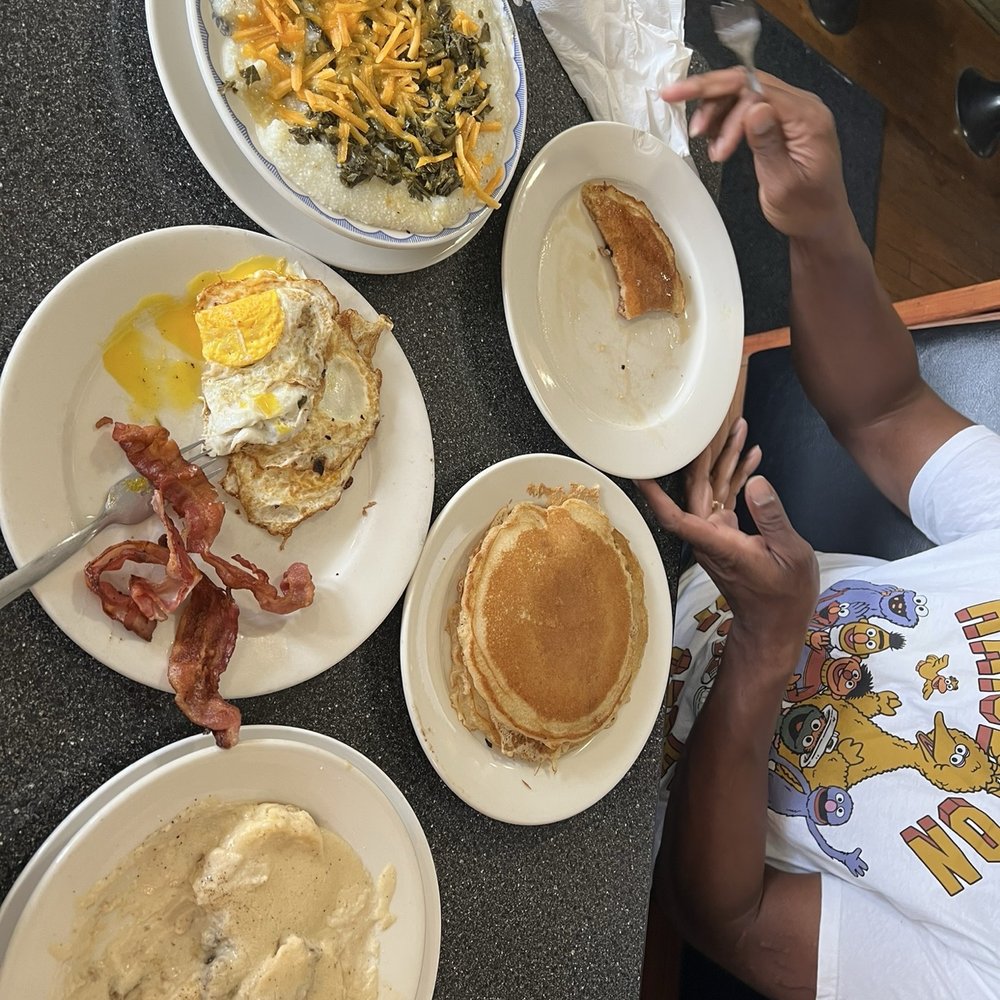 Dixie Restaurant - Grits & Greens, Triple Stack, Biscuits & Gravy, Two Eggs and bacon. - Southern Near Me - Petersburg, Virginia Dixie Restaurant - Grits & Greens, Triple Stack, Biscuits & Gravy, Two Eggs and bacon. - Southern Near Me - Petersburg, Virginia
