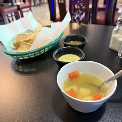La Cocina De Raquel - Greeted with small cup of soup (excellent) and chips with salsa.  Quiet background music, friendly server.