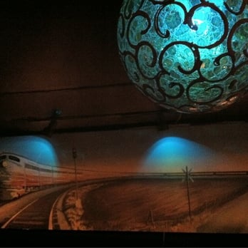 The Continental - a train passing through a tunnel - Lounges Near Me - Chicago, Illinois