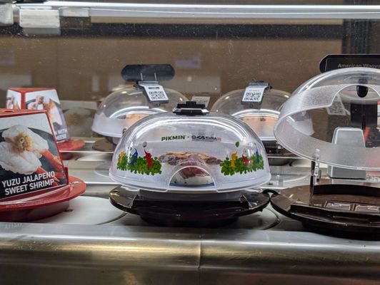Kura Revolving Sushi Bar by null