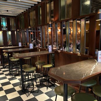 Dishoom - Seating near the entrance - Indian Near Me - London, XGL Dishoom - Seating near the entrance - Indian Near Me - London, XGL