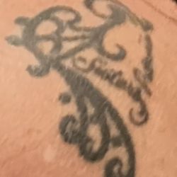Jewelry By Geno - The tattoo I designed and geno copied for pendant and he copied my mother's exact signature!