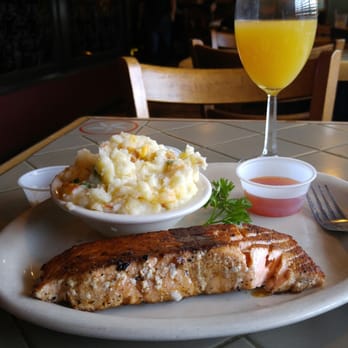 Pappy's Cafe - Salmon, smashed potatoes, a salad, and mimosa. - American Near Me - Houston, Texas Pappy's Cafe - Salmon, smashed potatoes, a salad, and mimosa. - American Near Me - Houston, Texas