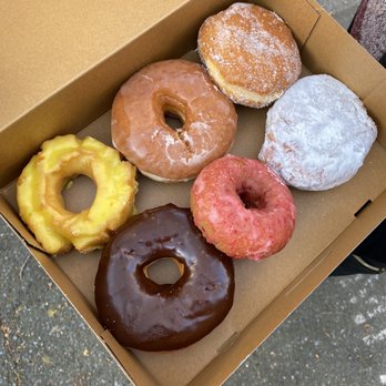 Top Pot Doughnuts - Lemon Old Fashioned, plain glazed, stuffed raspberry, powdered raspberry, cherry blossom, chocolate glazed - Bakeries Near Me - Seattle, Washington