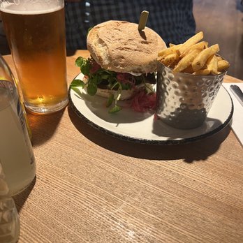 The Curator Bar and Dining - Mustard steak sandwich and skin potatoes. - British Near Me - London, XGL The Curator Bar and Dining - Mustard steak sandwich and skin potatoes. - British Near Me - London, XGL