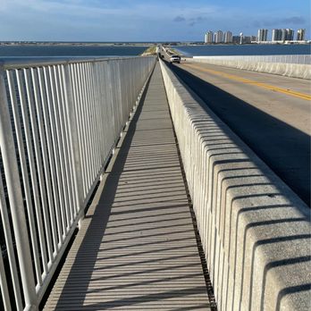 Navarre Beach Causeway - Running down the causeway pedestrian path toward the beach - Landmarks & Historical Buildings Near Me - Navarre, Florida Navarre Beach Causeway - Running down the causeway pedestrian path toward the beach - Landmarks & Historical Buildings Near Me - Navarre, Florida