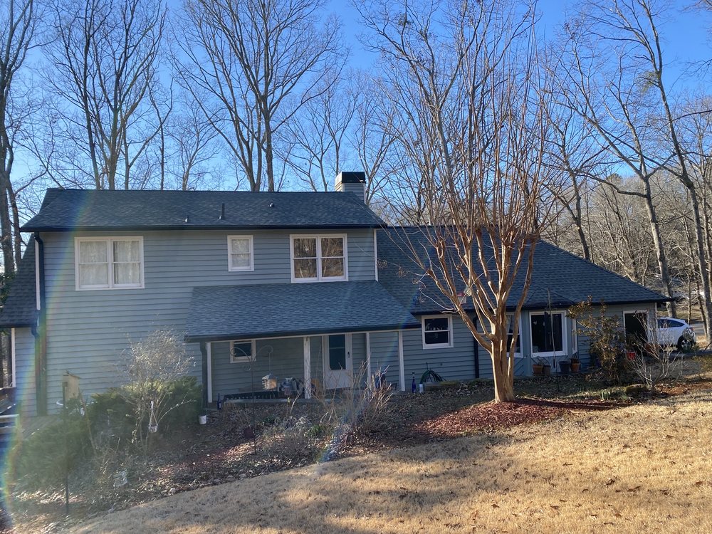 Slide of Leslies Roofing