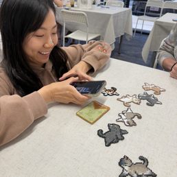 Owner showing us the card case she made