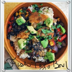 Tasty Take Out - Blackened fish, black bean, corn, pepper and onion salsa on a bed of rice topped with avacado with lime juice and cilantro.