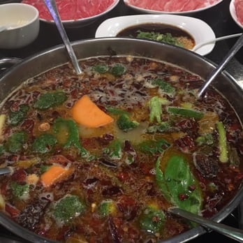 Happy Lamb Hot Pot - The pot - look at the insane amount of chilies - Chinese Near Me - Plano, Texas Happy Lamb Hot Pot - The pot - look at the insane amount of chilies - Chinese Near Me - Plano, Texas