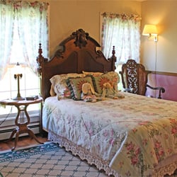 Belle Aire Mansion Guest House - The Victorian Room has a queen-sized bed with a hand-carved walnut headboard that is over 100 years old, private bath with sh...