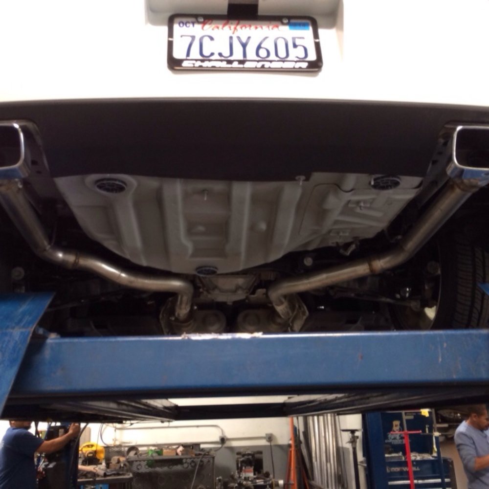 Gene's Muffler & Lara's Muffler - Challenger on the lift after i had my resos deleted. - Auto Repair Near Me - Downey, California Gene's Muffler & Lara's Muffler - Challenger on the lift after i had my resos deleted. - Auto Repair Near Me - Downey, California
