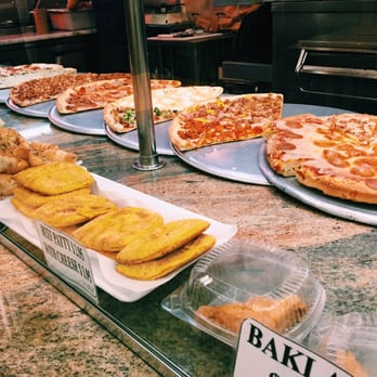 Cheesy Pizza - Their selection of pies and other edibles. - Pizza Near Me - New York, New York