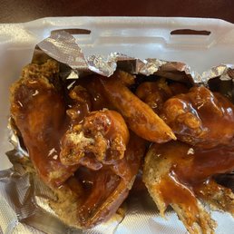 a close up of a sandwich in a styrofoam container