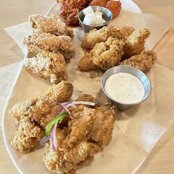 Mr Lee Chicken - Clockwise: Spicy, Garlic, Mr. Lee, Parmesan - too much breading, not enough flavor. - Chicken Wings Near Me - Concord, California Mr Lee Chicken - Clockwise: Spicy, Garlic, Mr. Lee, Parmesan - too much breading, not enough flavor. - Chicken Wings Near Me - Concord, California