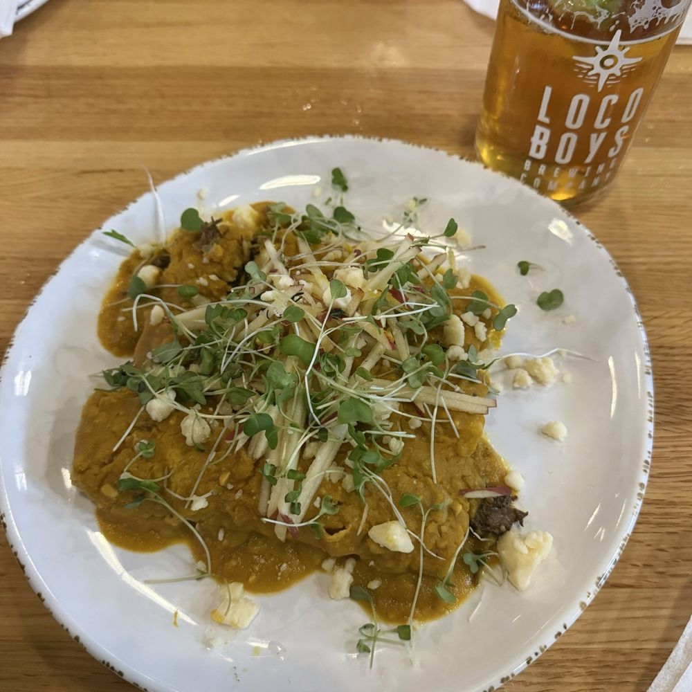 Short rib enchiladas. Hear me out- I know it looks like a pile of baby poop, but MAN IT WAS DELICIOUS. 10/10 recommend.