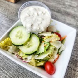 Next Door Pub - Side salad with house made blue cheese dressing