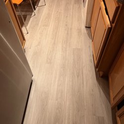 Weisman Home Outlets - Kitchen with hardwood.