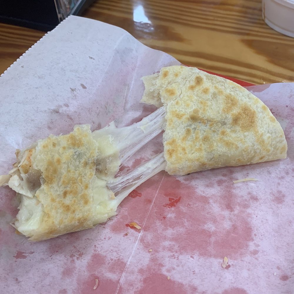 Ooey-Gooey Cheese-pull from the Chicken Quesadilla.