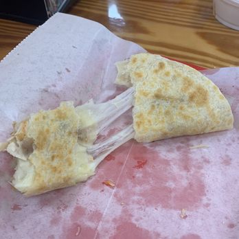 Taco Mel - Ooey-Gooey Cheese-pull from the Chicken Quesadilla. - Mexican Near Me - Lake Charles, Louisiana Taco Mel - Ooey-Gooey Cheese-pull from the Chicken Quesadilla. - Mexican Near Me - Lake Charles, Louisiana