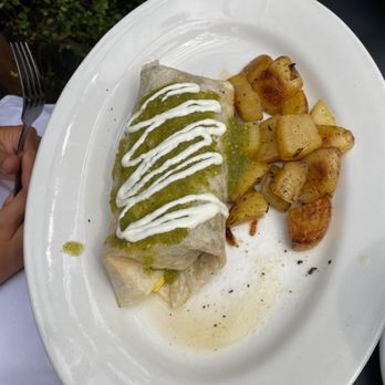Cafe Bernardo - Breakfast Burrito (potatoes half eaten sauce missing) - Breakfast & Brunch Near Me - Sacramento, California Cafe Bernardo - Breakfast Burrito (potatoes half eaten sauce missing) - Breakfast & Brunch Near Me - Sacramento, California