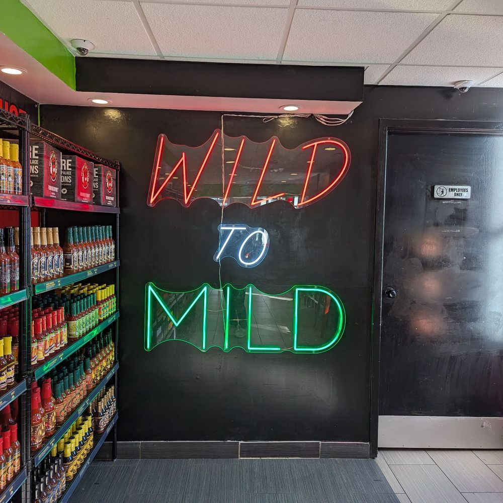 Pepper Palace - Back shelves with product stocked - Herbs & Spices Near Me - Annapolis, Maryland