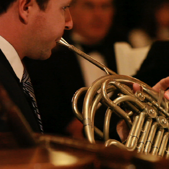 Paderewski Festival - a man playing a french horn - Music Venues Near Me Paderewski Festival - a man playing a french horn - Music Venues Near Me