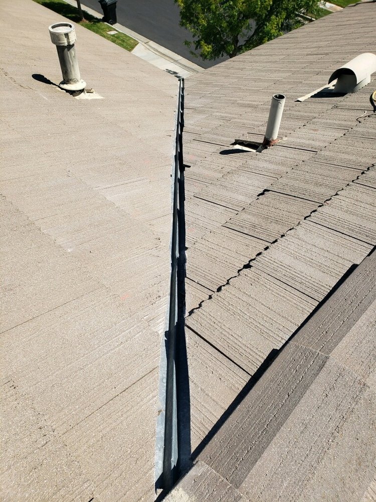 Slide of MTZ Roofing & Gutters