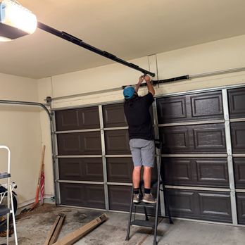 Local Garage Doors - Installing the new opener. - Garage Door Services Near Me
