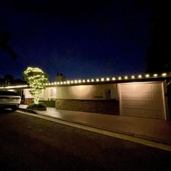 Stars Holiday Lighting - Festive exterior with landscape lighting