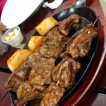 The Rockin Chicken - Anticuchos-beef hearts. I passed. - Peruvian Near Me - Hartford, Connecticut The Rockin Chicken - Anticuchos-beef hearts. I passed. - Peruvian Near Me - Hartford, Connecticut