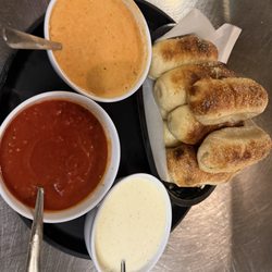 Milano’s Italian Grill - Famous breadsticks  Dipping Sauces for Breadsticks: pink sauce, alfredo sauce, marinara sauce
