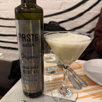 Pasta Eater - Organic olive oil on table and pistachio martini - Italian Near Me - New York, New York Pasta Eater - Organic olive oil on table and pistachio martini - Italian Near Me - New York, New York