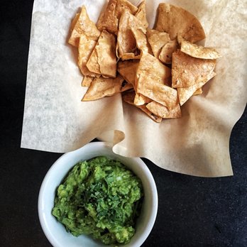 Comal - Fresh guacamole and right-out-of-the-fryer chips... Perfectly warm and crispy - Mexican Near Me - Berkeley, California