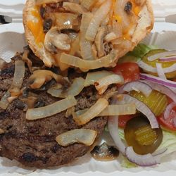 Cella Luna Pizza - Cella Luna Burger with Sauteed Mushrooms, Caramelized Onion, Cheddar Cheese, Red Onion, Tomato, Pickles, Lettuce