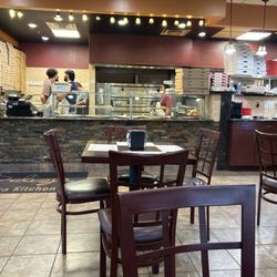 Delizia Pizza Kitchen - Indoor counter... friendly and helpful staff.