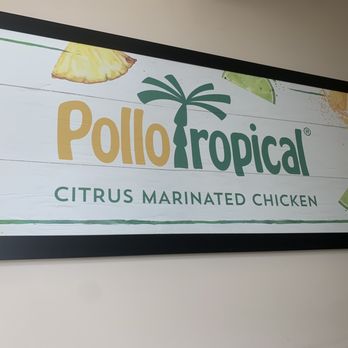 Pollo Tropical - a sign for a restaurant - Latin American Near Me - Tampa, Florida