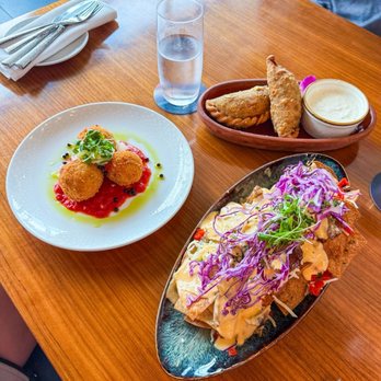 Aurora At The Celeste - Goat Empanadas, duck nachos and arancini - American Near Me - Orlando, Florida