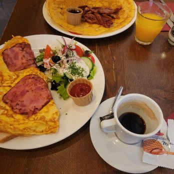The Pancake Bakery - Ham and cheese omelette. Breakfast special with juice, coffee,plain pancake, bacon, and syrup. - Pancakes Near Me - Amsterdam, New Hampshire The Pancake Bakery - Ham and cheese omelette. Breakfast special with juice, coffee,plain pancake, bacon, and syrup. - Pancakes Near Me - Amsterdam, New Hampshire