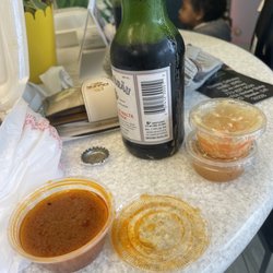 Caribbean Food Delight - Goat gravy & a malt beer