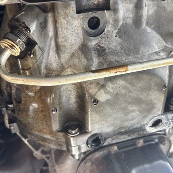 Glendale Automotive - As you see, the line is not completely screwed in which this line should have never been touched for a oil change. - Auto Repair Near Me - Indianapolis, Indiana Glendale Automotive - As you see, the line is not completely screwed in which this line should have never been touched for a oil change. - Auto Repair Near Me - Indianapolis, Indiana