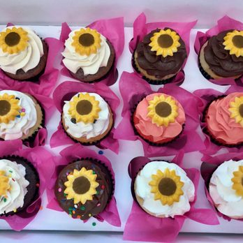 Baker's Boutique - Dozen assorted cupcakes.  Flavor of the day is fun! - Custom Cakes Near Me - Grand Junction, Colorado