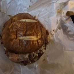 Grease in flat pretzel bun Grease in flat pretzel bun