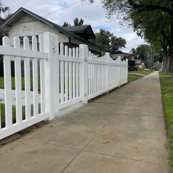 CurvConstruction - 4' scalloped top white picket fencing with a 4' walk gate - Fences & Gates Near Me