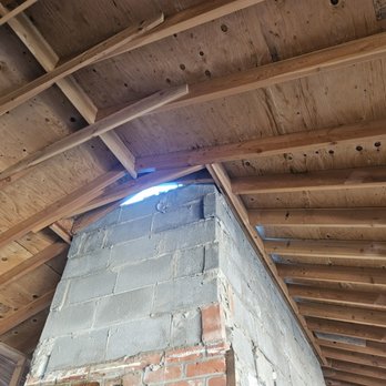 Big Elk Construction - Making room for chimney. - General Contractors Near Me Big Elk Construction - Making room for chimney. - General Contractors Near Me