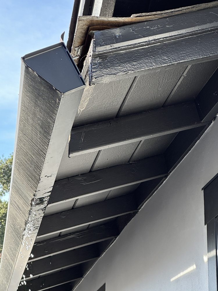 Slide of Cosmos Roofing